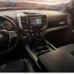Black interior cabin and dashboard layout of a 2026 RAM 1500 truck.