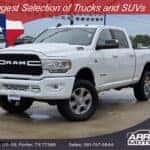 Pre-Owned 2022 Ram 2500 Big Horn heavy-duty truck for sale at Arriba Motors in Porter TX with financing, near Kingwood, Conroe, and Humble