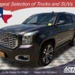 Front view of 2018 GMC Yukon Denali for sale in Porter TX with premium grille