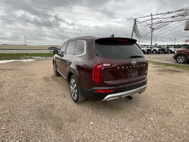 Interior of 2021 Kia Telluride S with 3-row seating and modern infotainment