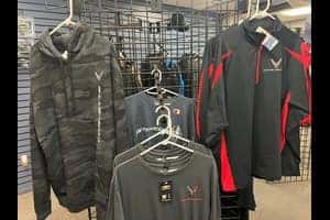 Chevrolet and Corvette branded shirts on display at Bill Kay Chevrolet Pro Shop in Lisle, IL