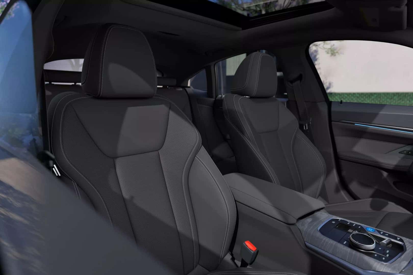interior of the bmw i4, featuring premium black seats and a stylish modern sunroof