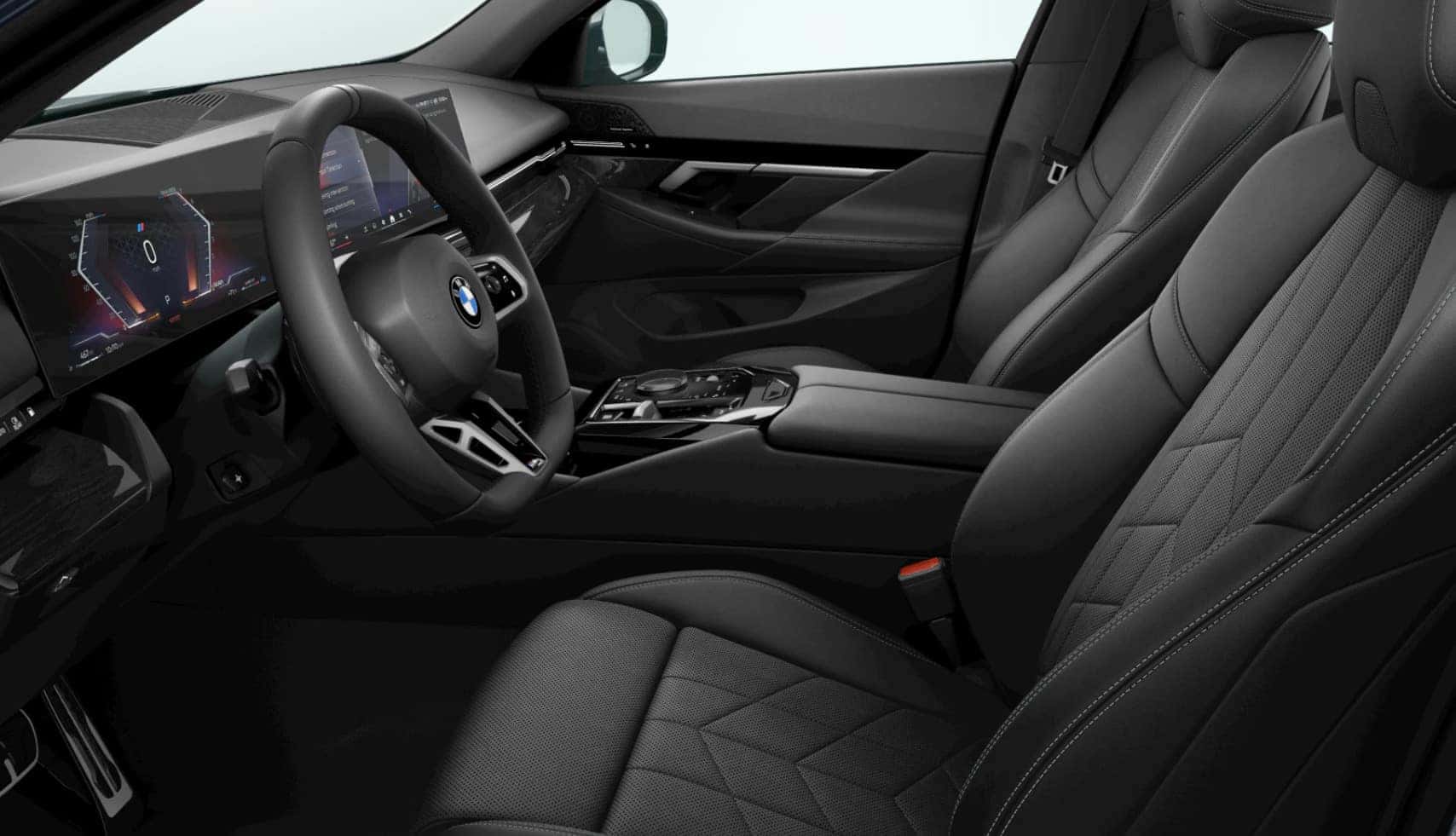 Luxury black leather interior of the BMW 5 Series Core Model with advanced digital displays and premium seating.