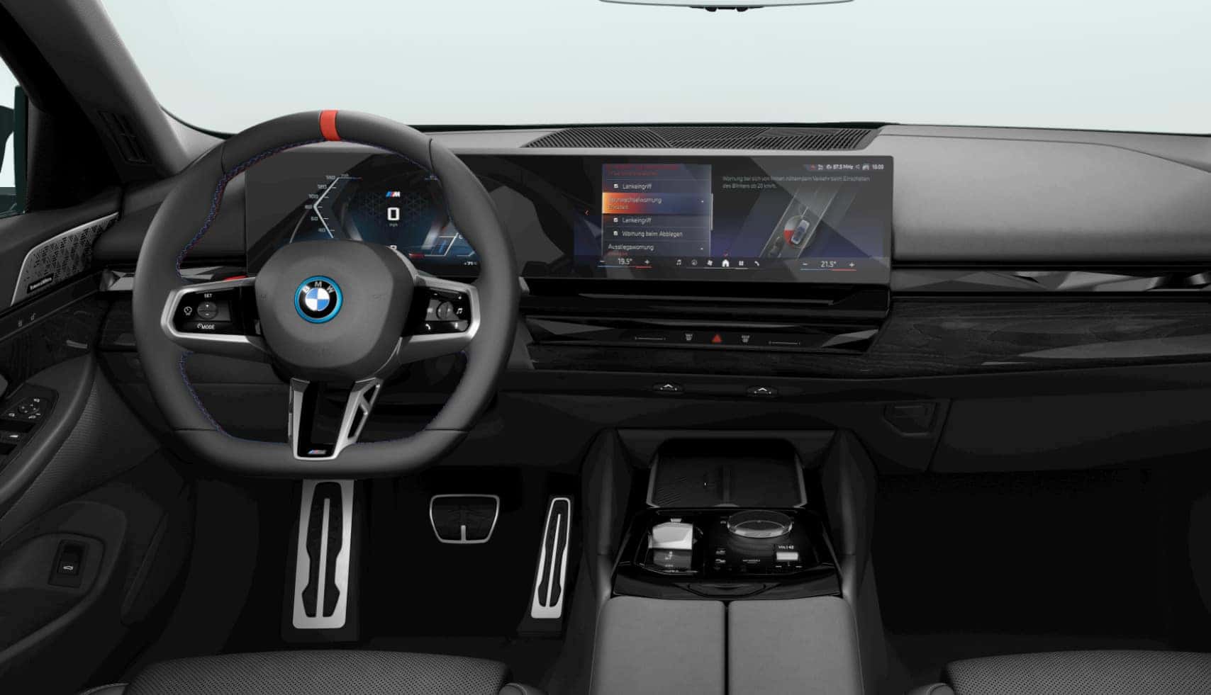 BMW i5 M60 interior featuring a digital cockpit, M Sport steering wheel with red center stripe, and curved infotainment display.
