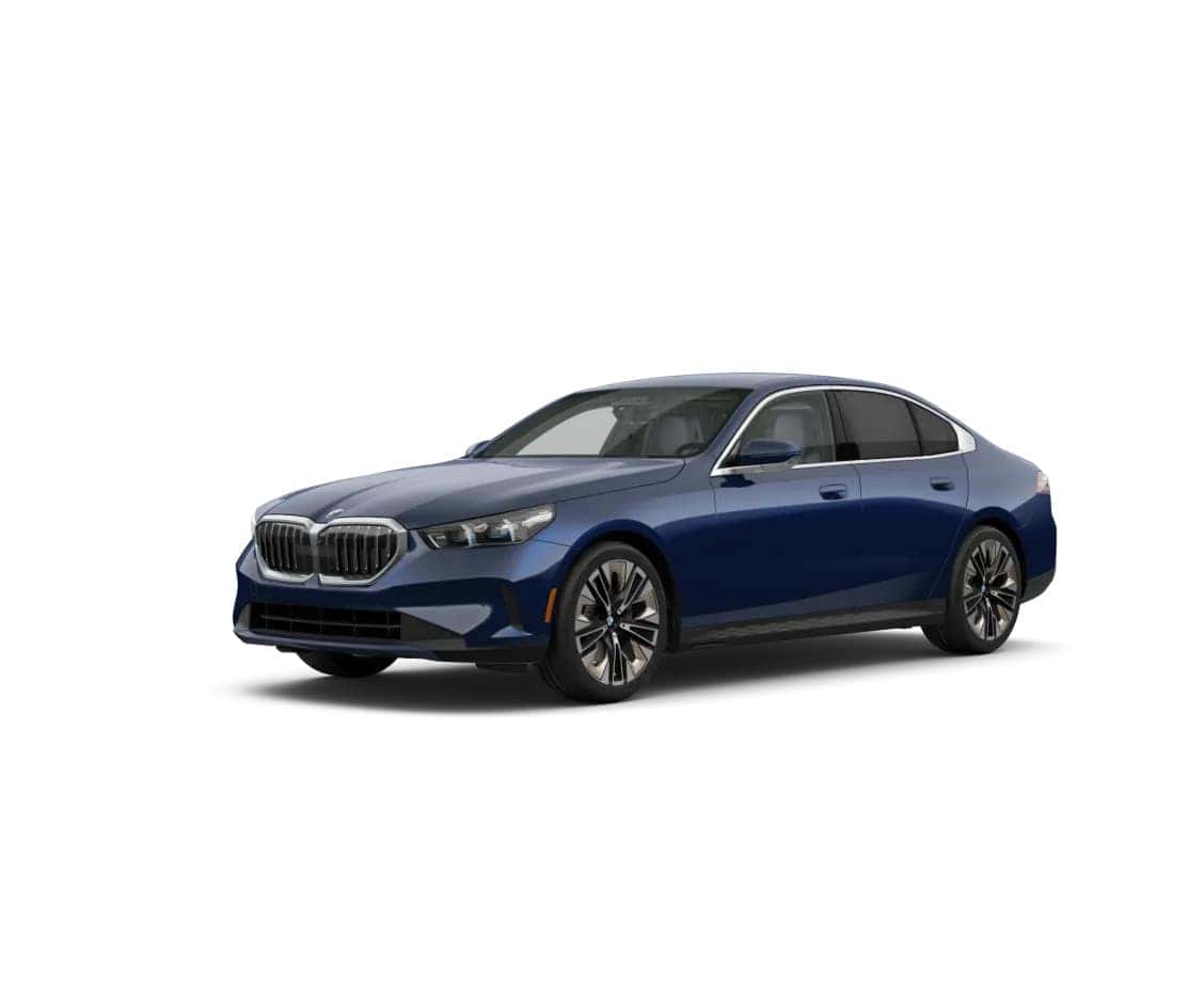 2025 BMW 530i and 540i xDrive sedans in blue, shown from a front-side angle on a white background