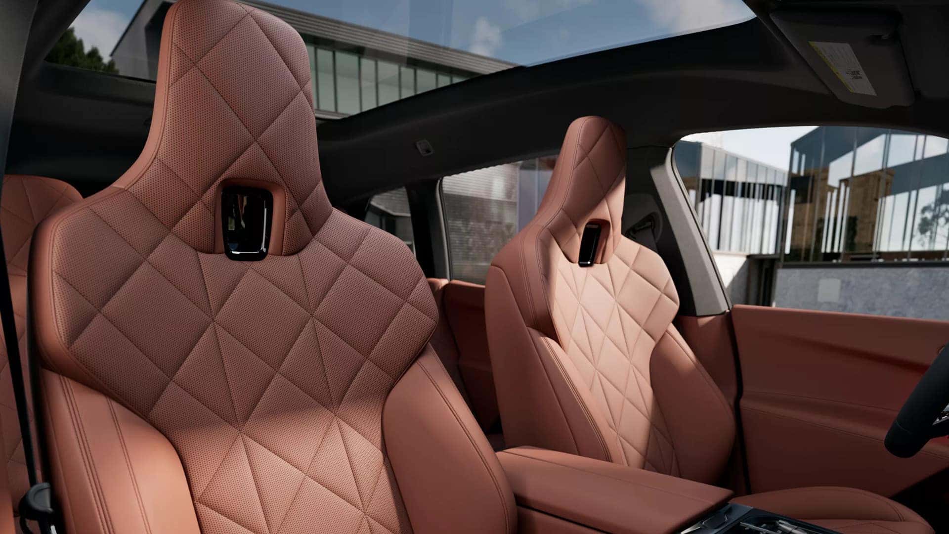 castanea chstnut perforated leather interior showcasing the panoramic sunroof.