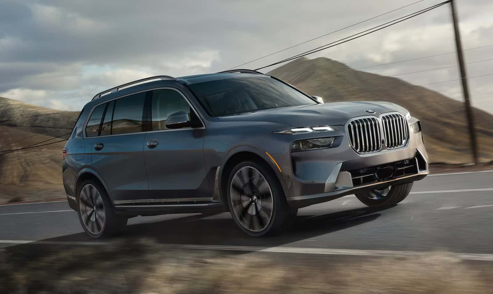 2026 bmw x7 driving on a pave road
