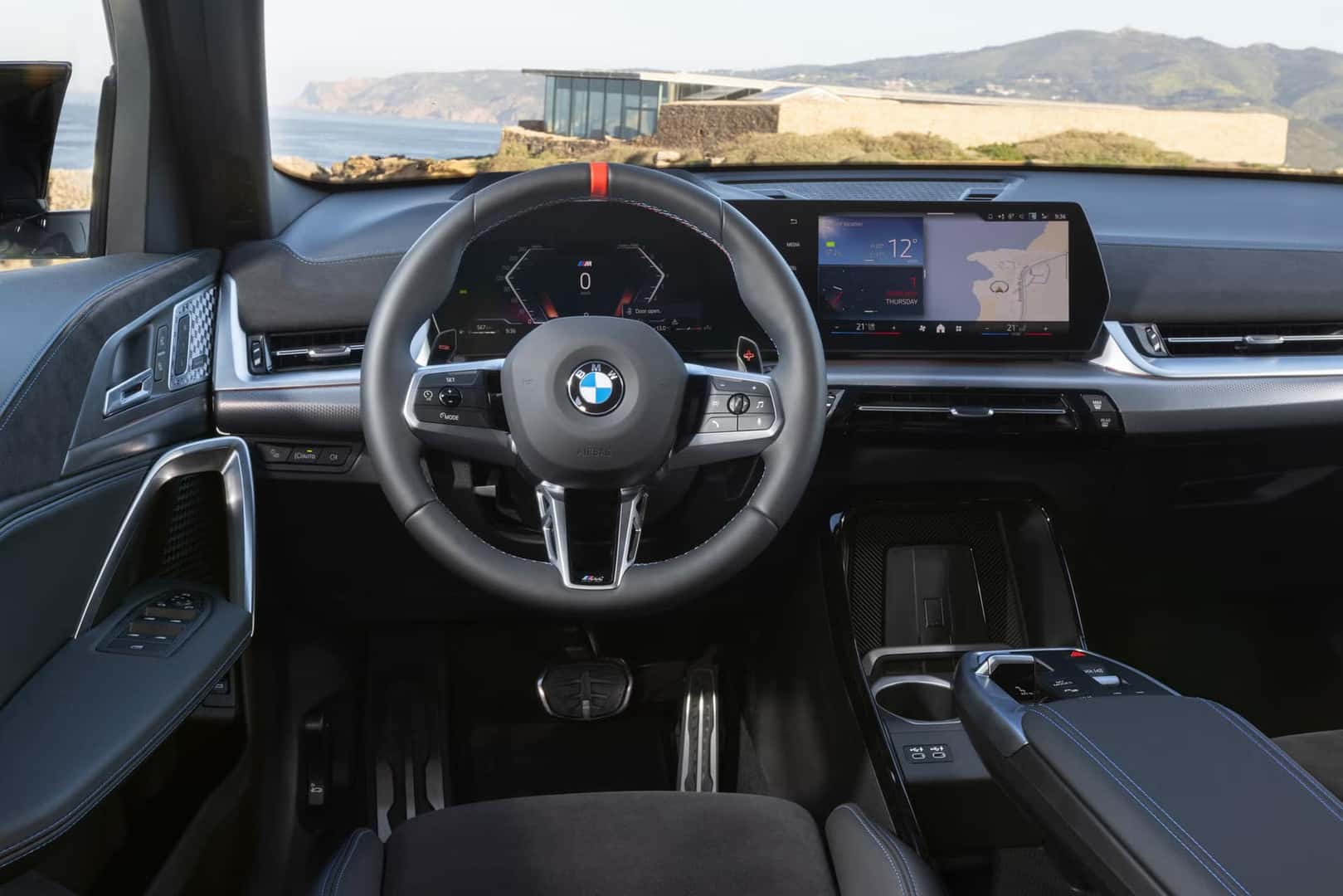 2026 BMW X2 M35i xDrive interior with M sport steering wheel and digital display