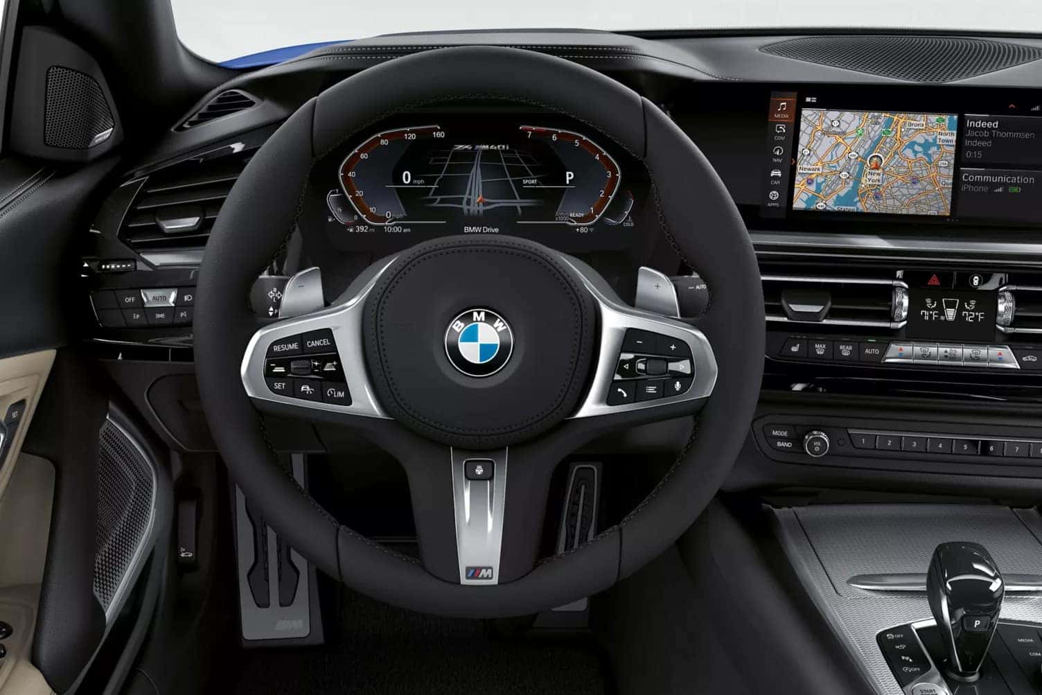 cockpit view of the 2026 bmw z4 showcasing the curved infotainment and digital cluster display