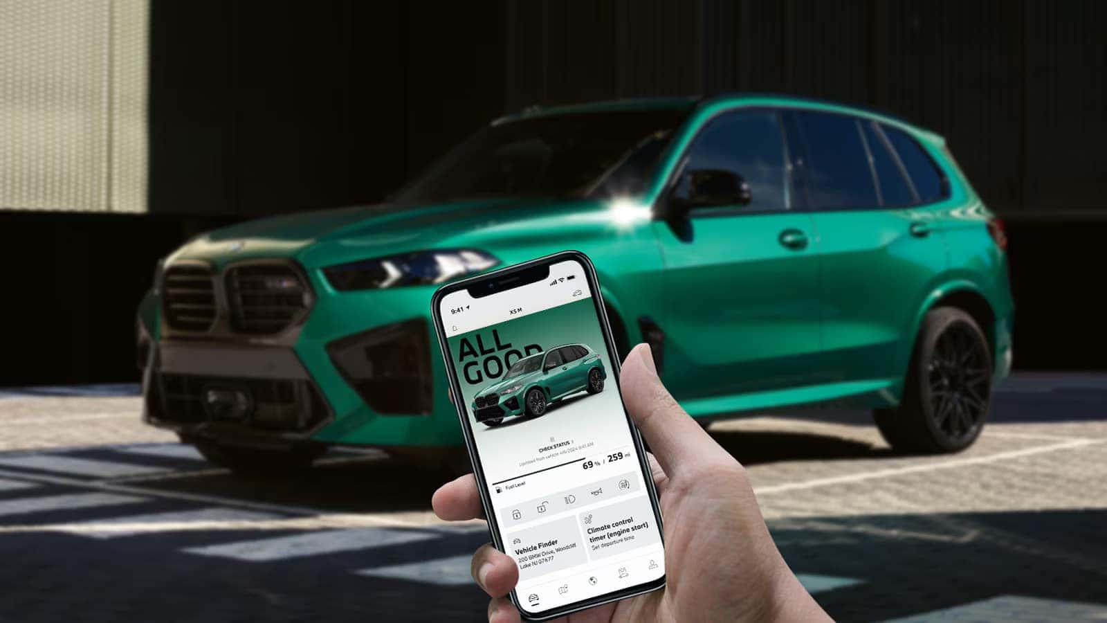 a view of someone using the BMW app to look at the service update on their BMW X5