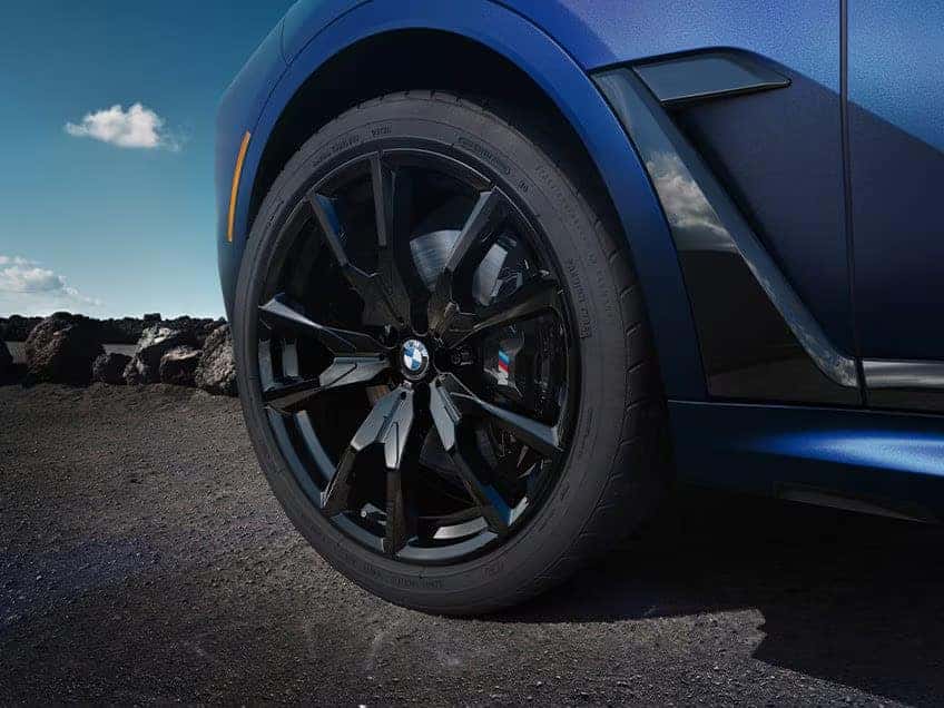 a view of the front rims and tires of the 2026 BMW X7