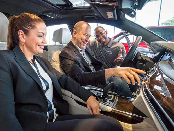 three BMW Genius sitting in a BMW IX