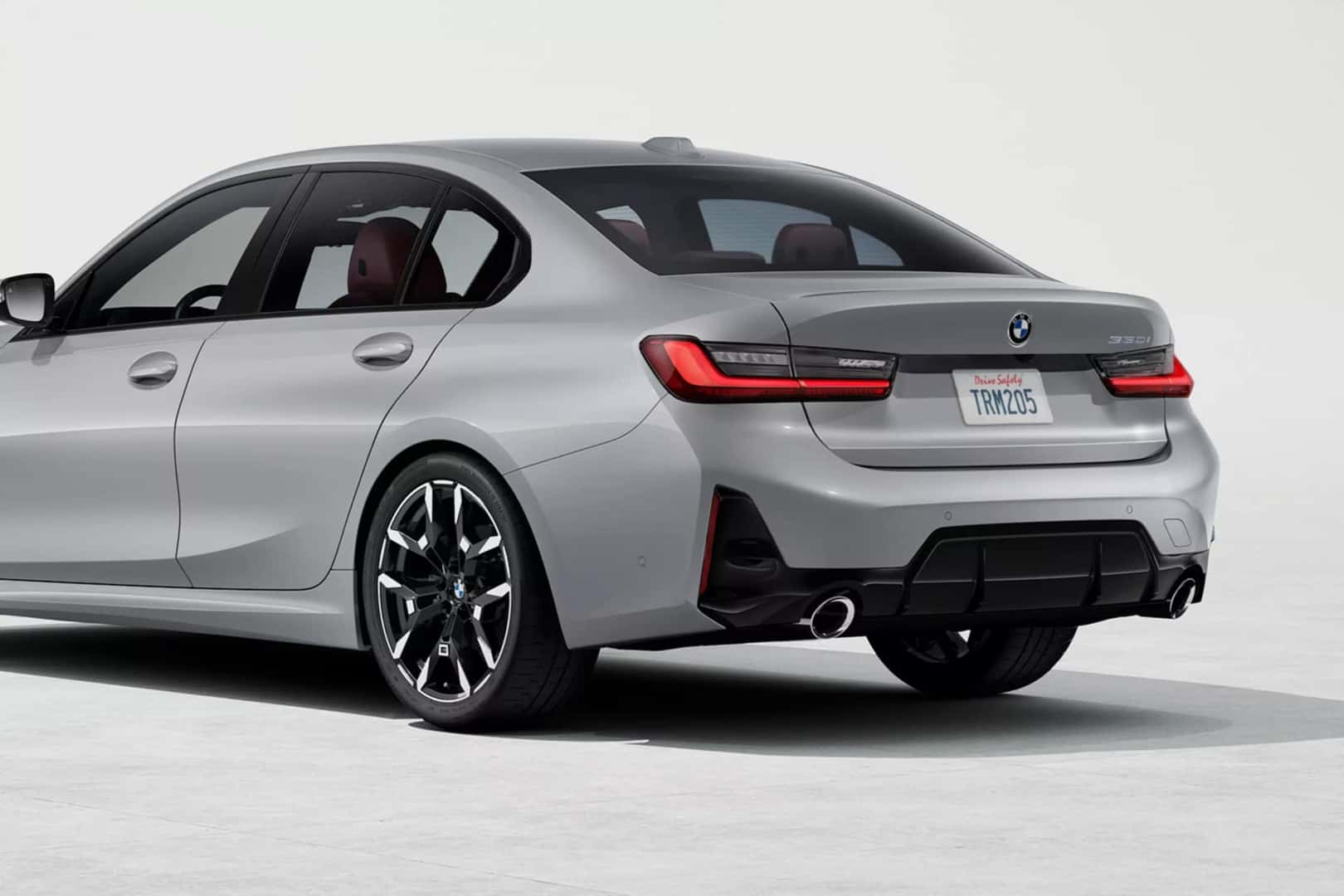 2026 BMW 3 Series parked in a show room