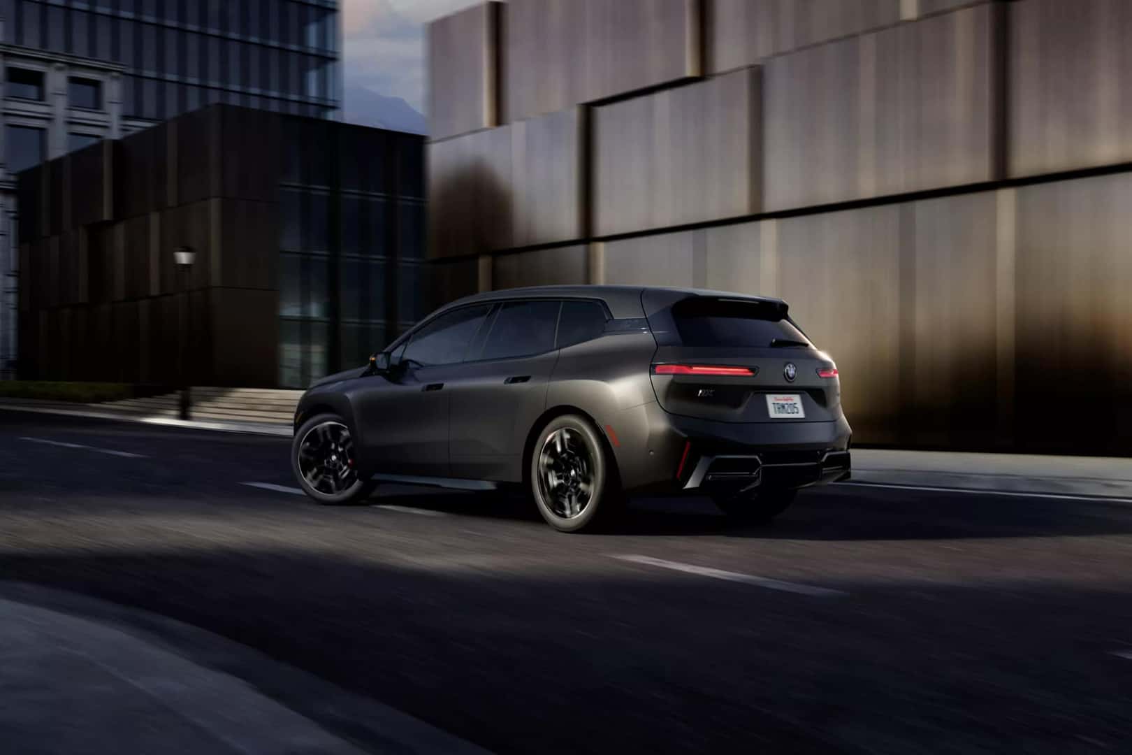 2026 BMW IX driving in the city