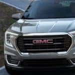 Quicksilver Metallic 2022 GMC Terrain on a curving road_mobile