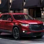 Red 2020 Chevrolet Traverse on a City St at Night_mobile