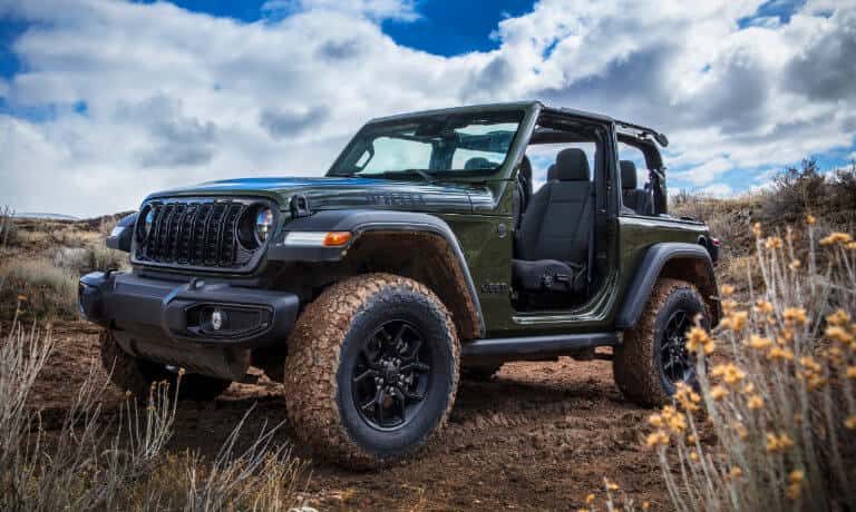 2026 Jeep Wrangler with doors off in mud