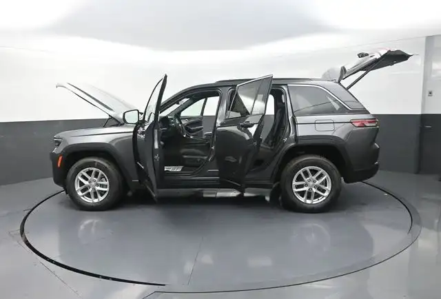 Rear view of a gray 2026 Jeep Grand Cherokee
