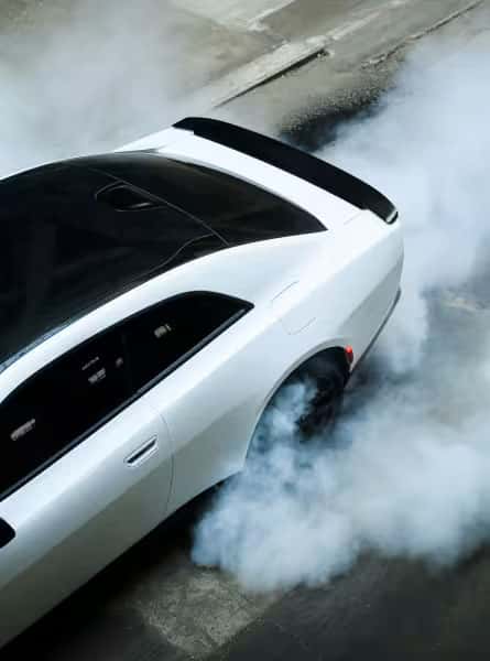dodge vehicle drifting on concrete