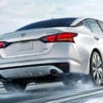 Nissan Altima driving in the snow