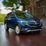 Blue Buick Encore GX SUV Outside Building