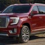 Red GMC Yukon Denali Outside