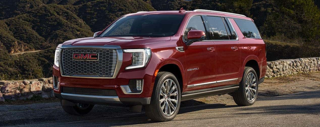 Red GMC Yukon Denali Outside