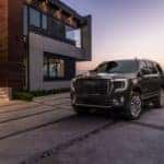 Gray GMC Yukon SUV Outside Home