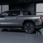 GMC Sierra EV Edition 1 plugged into a charging station.