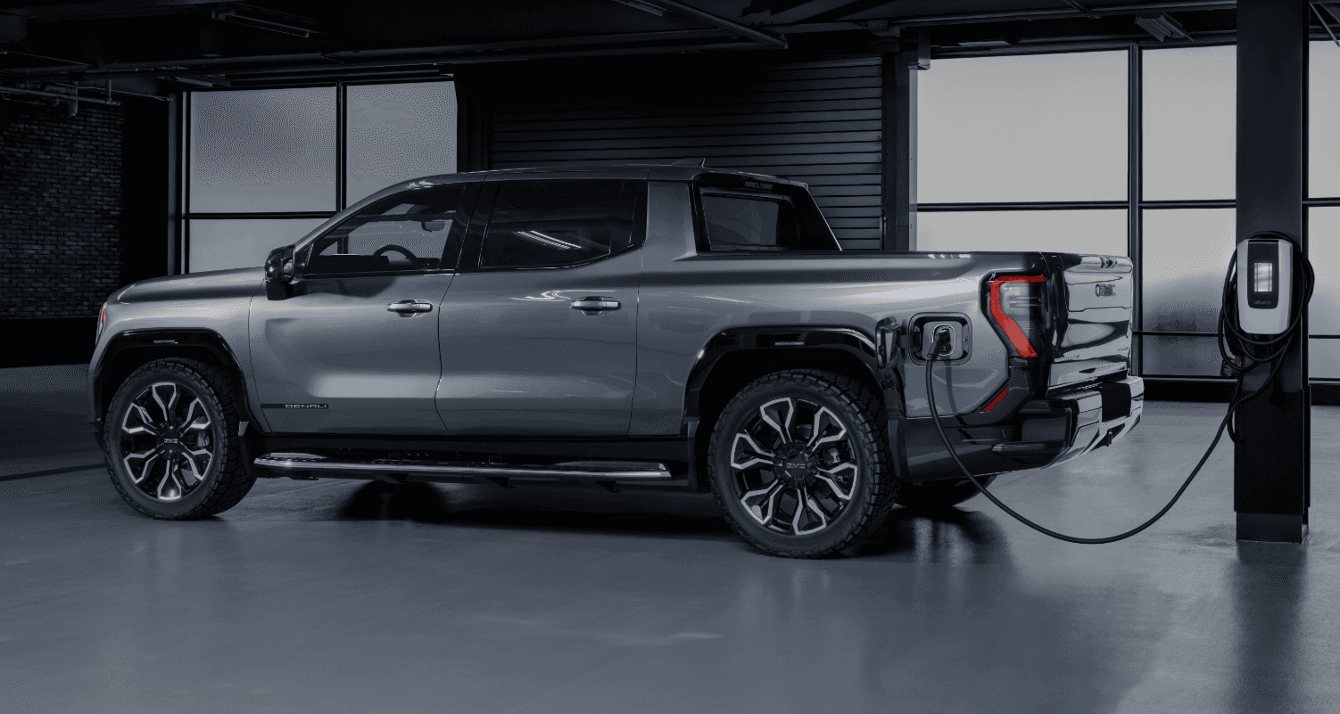 GMC Sierra EV Edition 1 plugged into a charging station.