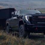 Onyx Black GMC Sierra Heavy-Duty 2025 Towing a Trailer