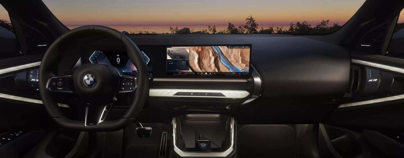 Steering wheel and dashboard of a 2025 BMW X3.