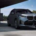 A silver 2025 BMW X3 for sale parked on a driveway.