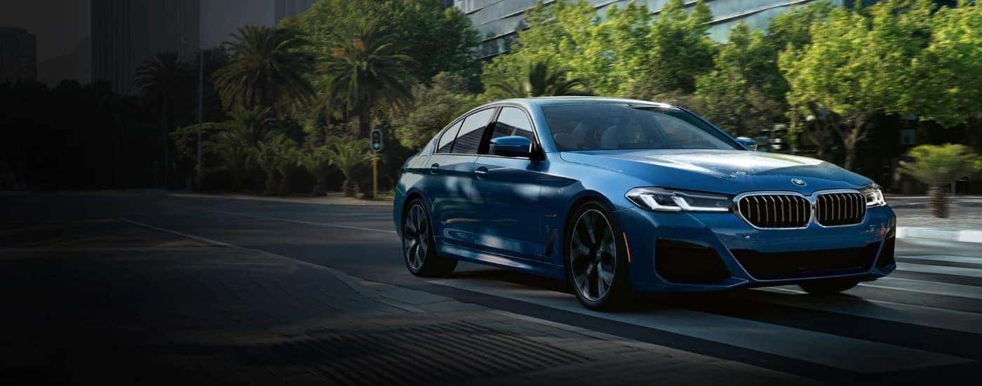 A blue used 2023 BMW 530e for sale near Cave Spring