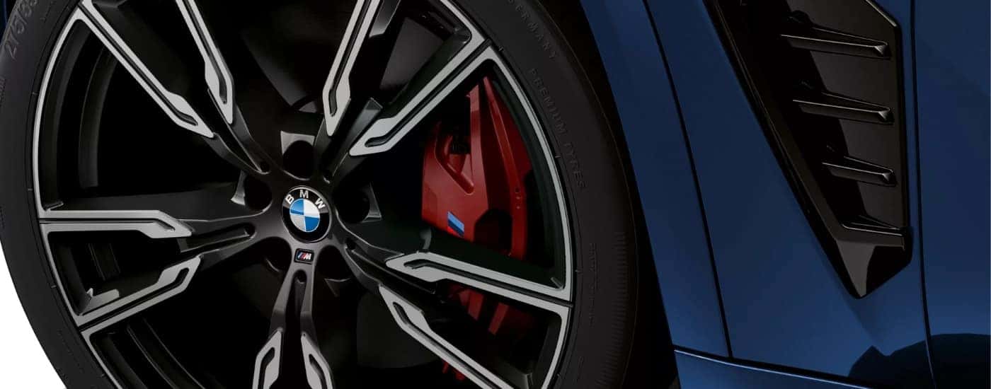 Wheel on a blue 2026 BMW X5 M60i
