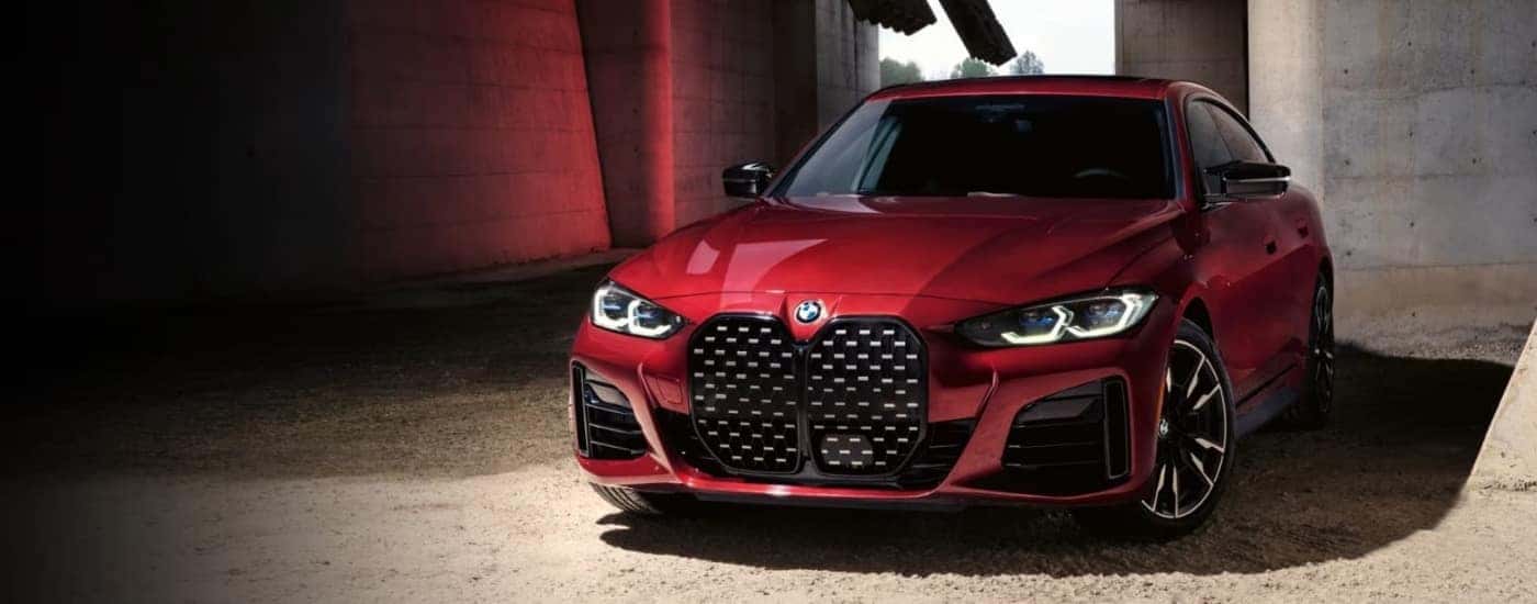 Red 2024 BMW M440i parked to look at luxury cars for sale in Roanoke