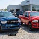 Side-by-side comparison of the 2025 RAM 2500 and 2024 RAM 2500 pickup trucks.