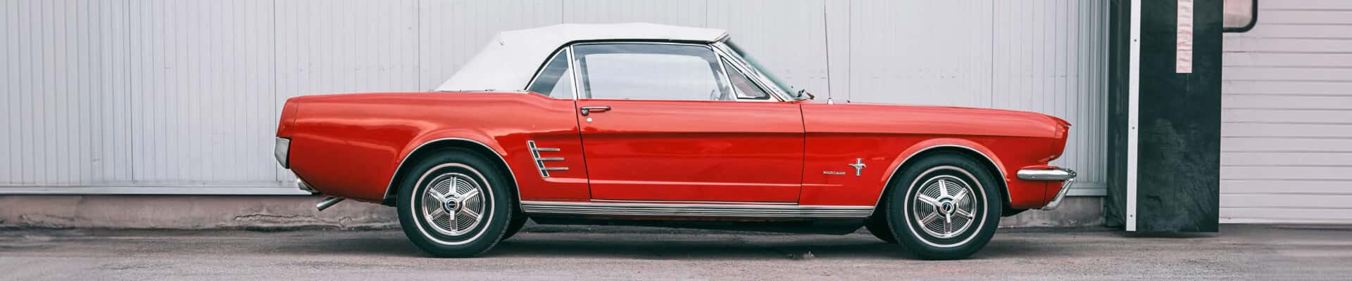 Classic Red Ford Mustang Convertible with White Top