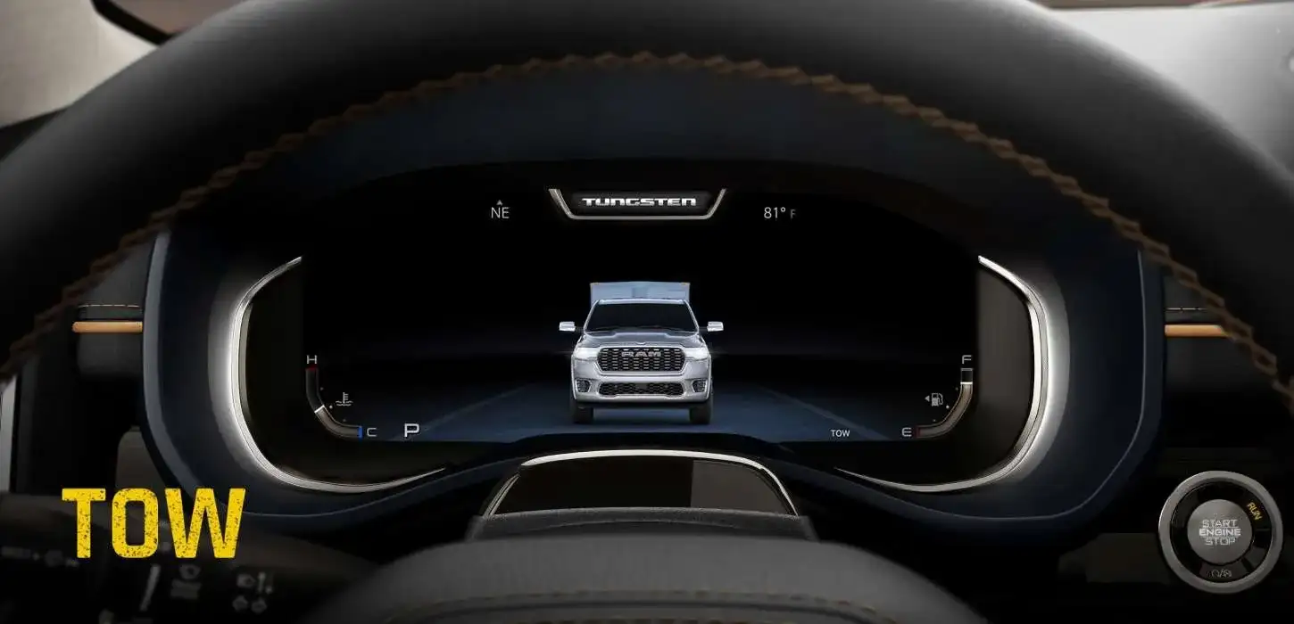 Digital cluster display showing Tow drive mode