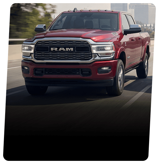 Red RAM truck parked in a city setting