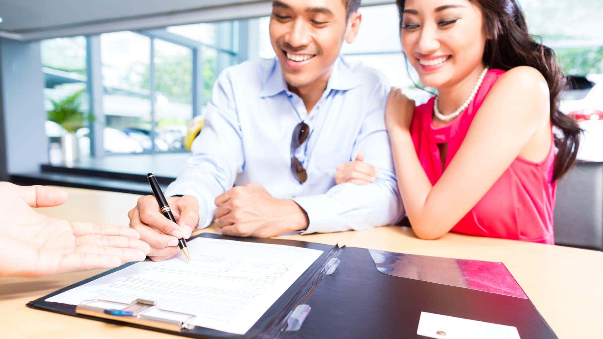 People signing contract