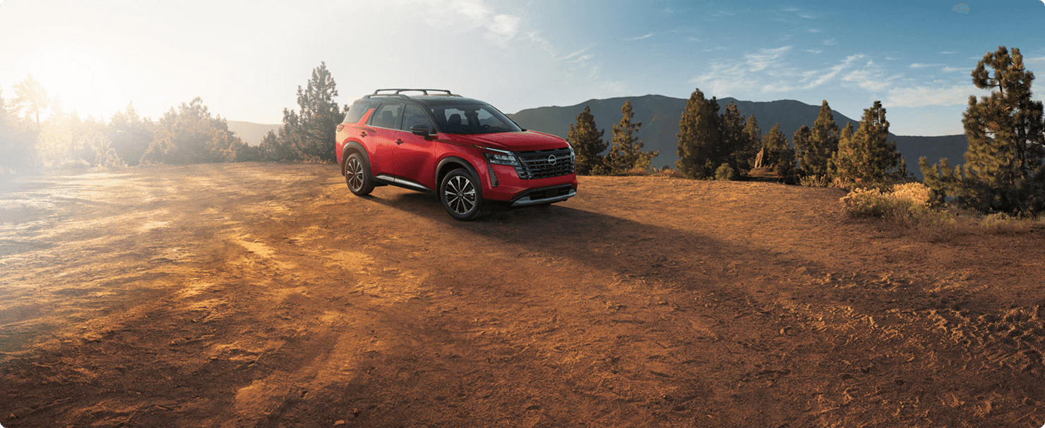 2026 Nissan Pathfinder side profile on scenic road