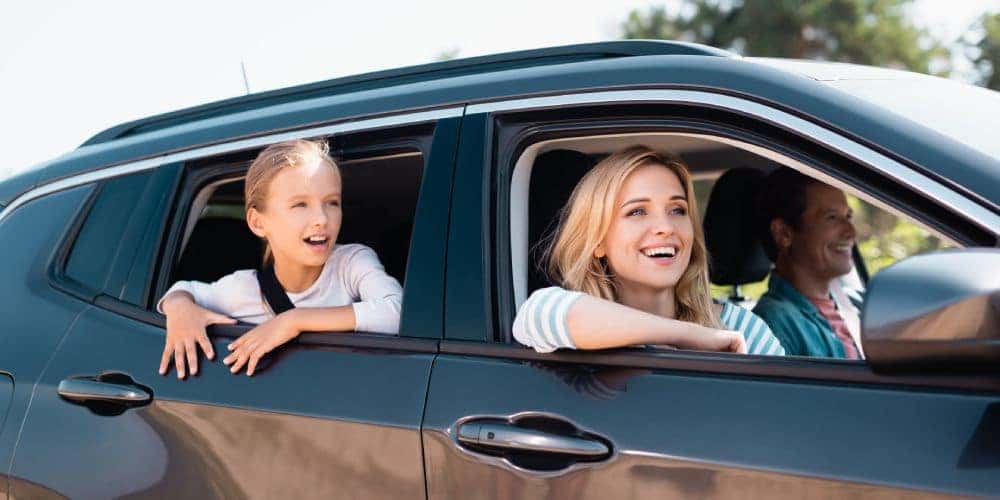 Happy Family In Vehicle